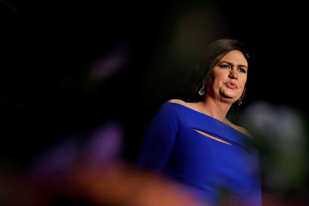 PHOTO: White House Press Secretary Sarah Sanders arrives on stage at the White House Correspondents' Association dinner in Washington, April 28, 2018. 