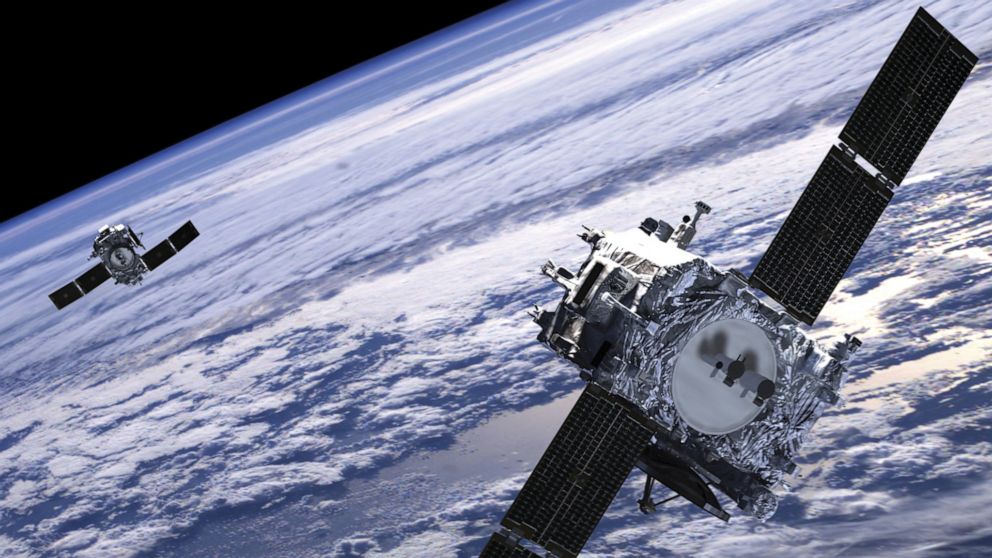 PHOTO: An artist's  conception of satellites in Earth's Orbit.