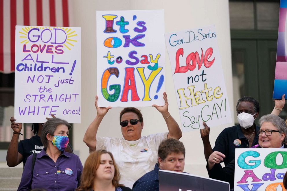 PHOTO: Demonstrators gather to speak on the steps of the Florida Historic Capitol Museum in front of the Florida State Capitol, March 7, 2022, in Tallahassee, Fla.