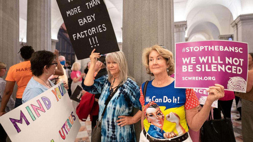 PHOTO: Abortion-rights activists wait for state lawmakers to arrive before a Senate vote on a ban on abortion after six weeks of pregnancy at the South Carolina Statehouse on May 23, 2023 in Columbia, S.C.