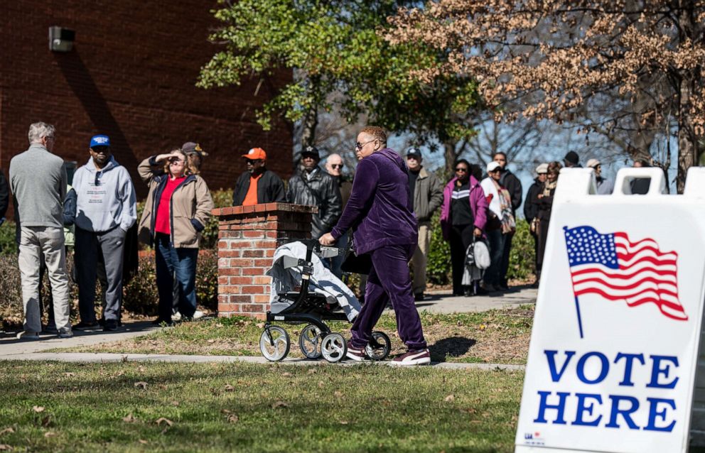 PHOTO: People stand in line for early voting at the Richland County Election Commission, Feb. 27, 2020 in Columbia, S.C.