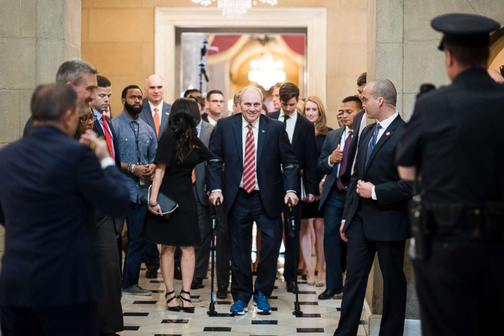 PHOTO: House Majority Whip Steve Scalise, R-La., walks with his wife Jennifer from the House chamber to his office in the Capitol on his first day back in Congress, Sept. 28, 2017. 