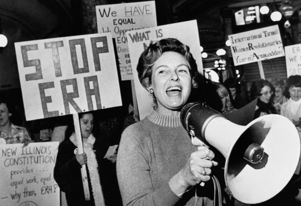 PHOTO: Stop ERA national Chairman Phyllis Schafly leads members opposed to the equal rights amendment in a song about the pro ERA forces plan for a national demonstration, April 27, 1976. 