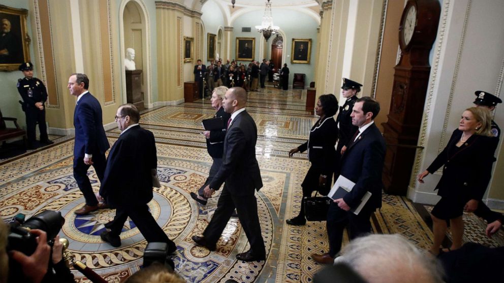 PHOTO: House Democratic impeachment managers, led by House Intelligence Committee Chairman Adam Schiff, arrive for the start of the impeachment trial of President Donald Trump at the Capitol in Washington, Jan. 21, 2020.