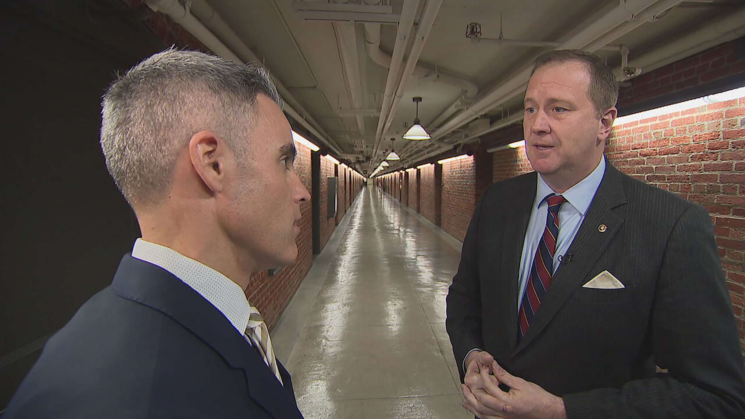 PHOTO: Sen. Eric Schmitt, right, talks with ABC's Devin Dwyer.