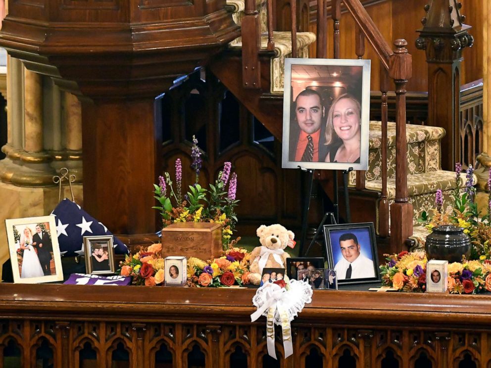 PHOTO: A unity urn with cremated ashes of Robert Joseph Dyson and Mary E. Dyson is set in place as friends and family prepare for a funeral mass for eight of the 20 people killed in a limousine crash in Schoharie, N.Y., Oct. 13, 2018.