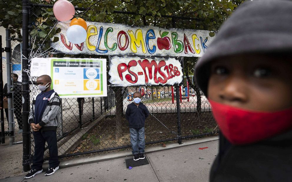 PHOTO: Students arrive for the first day of in-person learning at the P.S. 188 in New York, Sept. 29, 2020.