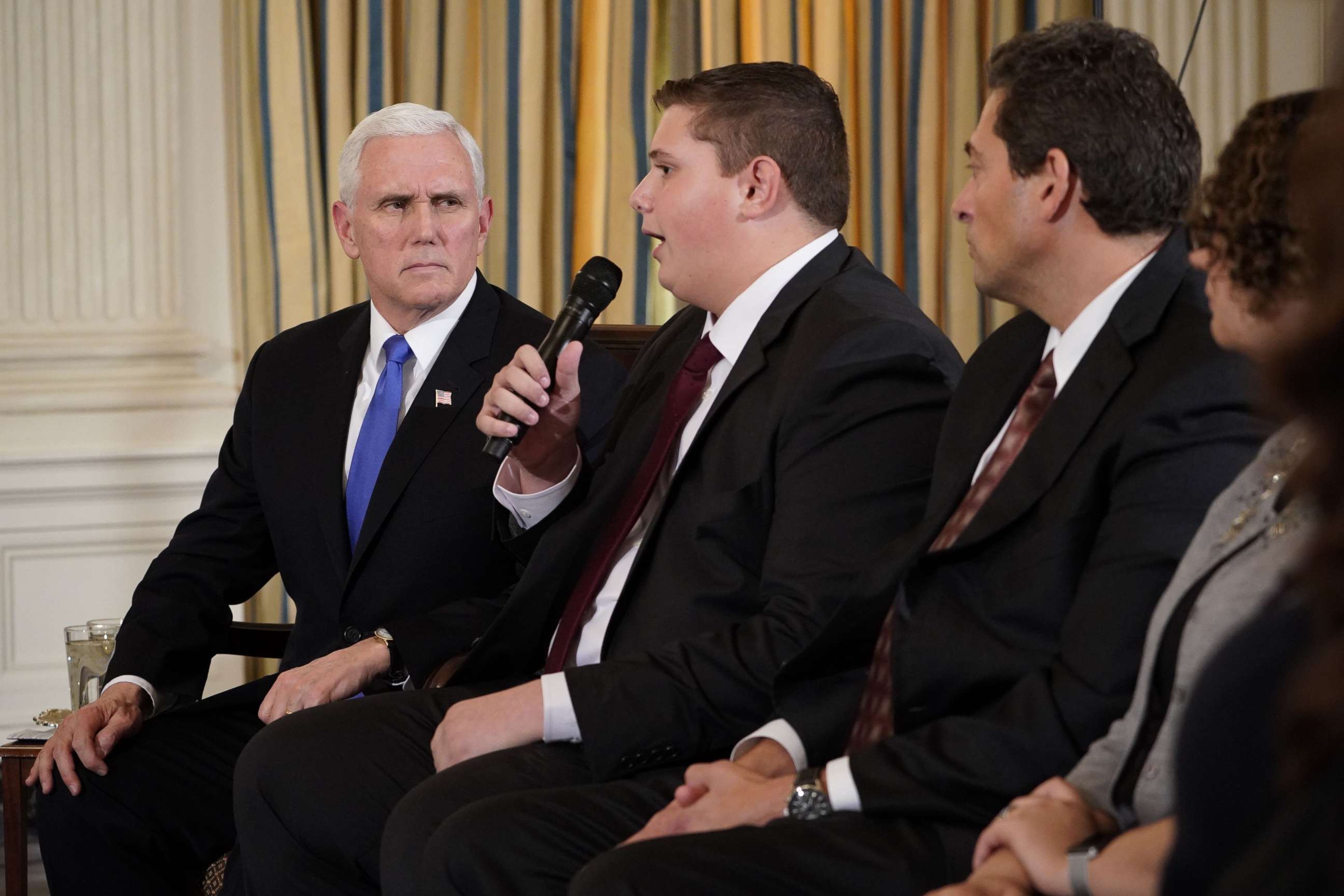 PHOTO: Vice President Mike Pence takes part in a listening session on gun violence with teachers and students in the State Dining Room of the White House on Feb. 21, 2018.