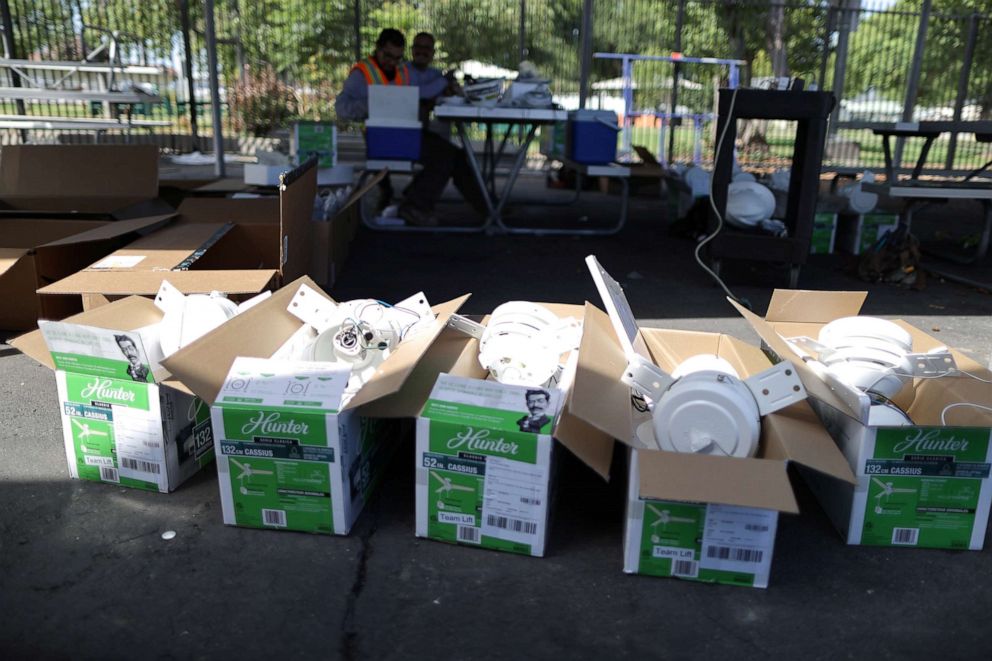 PHOTO: New ceiling fans to increase classroom air flow are seen during summer break renovations and installation of social distancing measures at St. Joseph's School in La Puente, near Los Angeles, Calif., July 14, 2020.