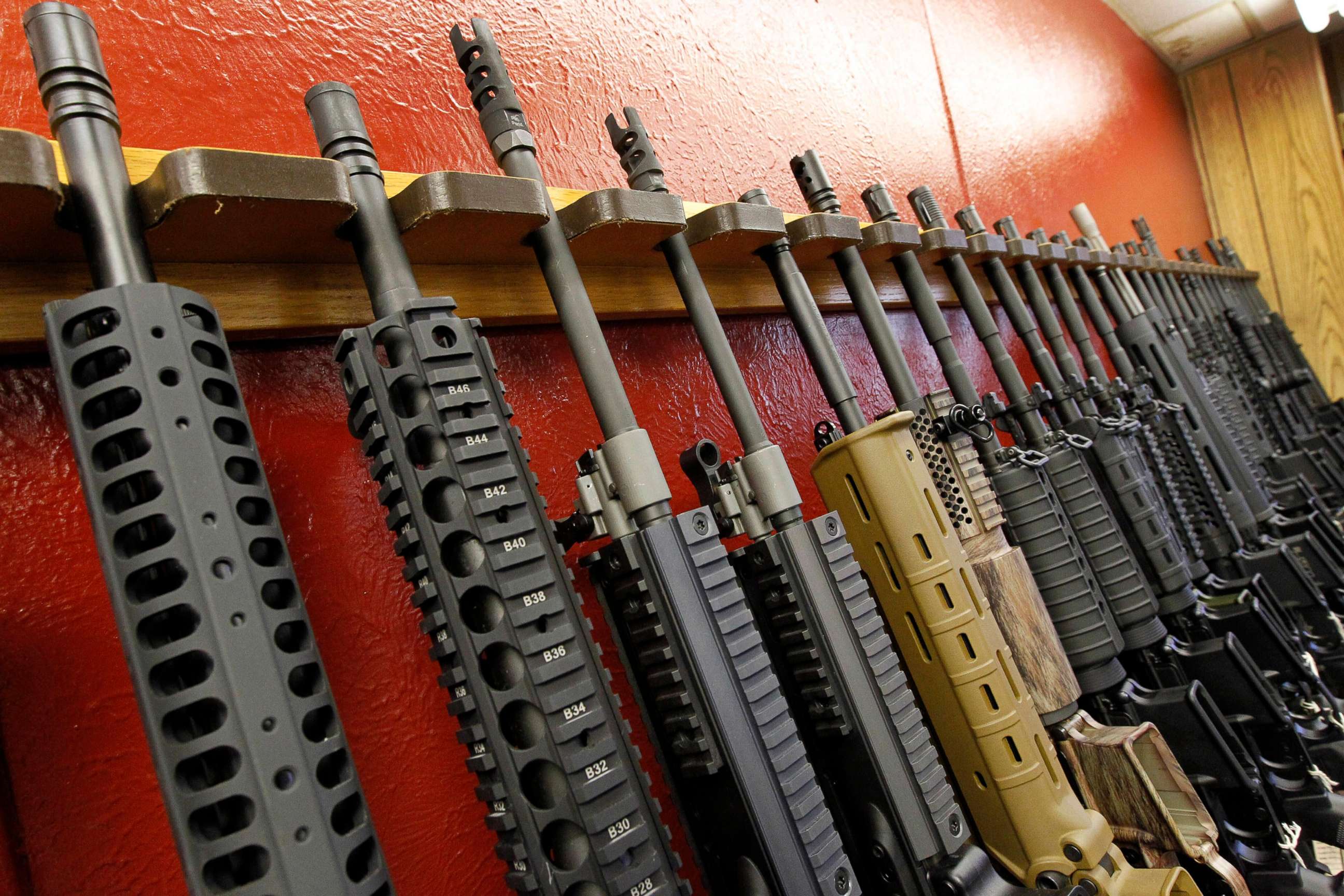 PHOTO: A row of rifles for sale are displayed at a gun shop in Aurora, Colo., on July 20, 2012. 