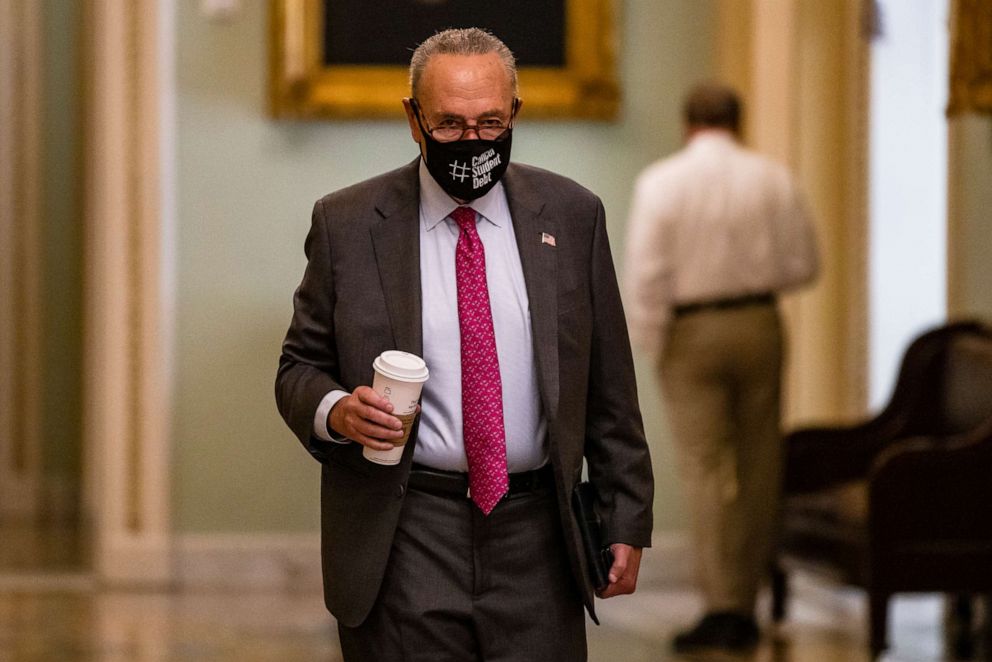 PHOTO: U.S. Senate Majority Leader Chuck Schumer heads to his office in the U.S. Capitol Building on August 10, 2021, in Washington, DC.