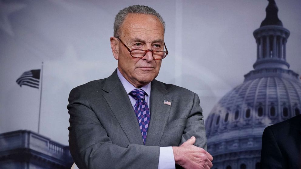 PHOTO: Senate Majority Leader Chuck Schumer listens during a news conference following a closed-door caucus lunch, at the Capitol in Washington, July 19, 2022.