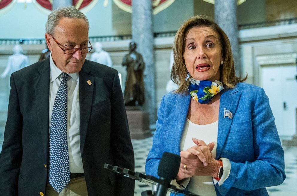 PHOTO: House Speaker Nancy Pelosi, with Senate Minority Leader Chuck Schumer, speaks to reporters at the Capitol with White House chief of staff Mark Meadows and Treasury Secretary Steven Mnuchin on a COVID-19 relief bill, Aug. 1, 2020, in Washington.