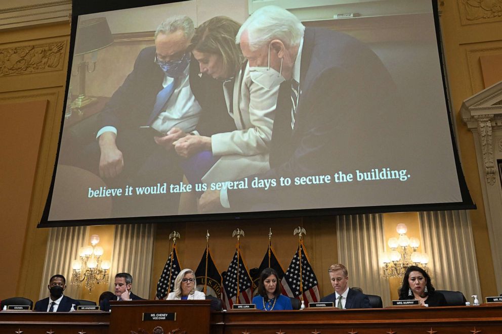 PHOTO: A video of Senate Majority Leader Chuck Schumer, House Speaker Nancy Pelosi, and House Majority Leader Steny Hoyer taking a phone call, is shown during a hearing to investigate the January 6th attack in Washington, D.C., on July 21, 2022.