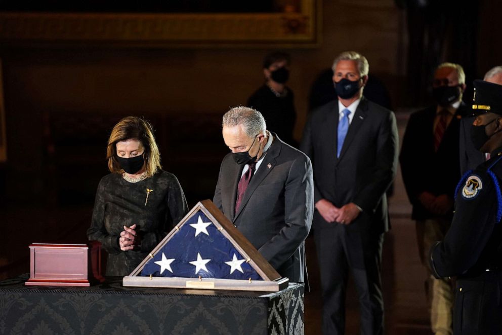 PHOTO: House Speaker Nancy Pelosi and Senate Mayority Leader Chuck Schumer pay their respects to late U.S. Capitol Police officer Brian Sicknick, who died while protecting the Capitol during the Jan. 6 attack, in the Rotunda in Washington, Feb. 2, 2021.