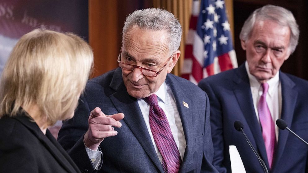 PHOTO: Senate Minority Leader Chuck Schumer points to Democratic Presidential Candidate Senator Kirsten Gillibrand during a press conference on the Senate impeachment trial of President Donald Trump, Jan, 24, 2020 in Washington, D.C.