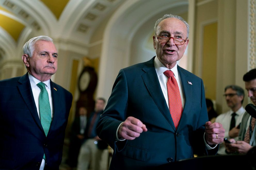 PHOTO: Senate Majority Leader Chuck Schumer joined by Senate Armed Services Committee Chairman Jack Reed, left, speaks to reporters about the National Defense Authorization bill, at the Capitol in Washington, D.C., July 26, 2023.