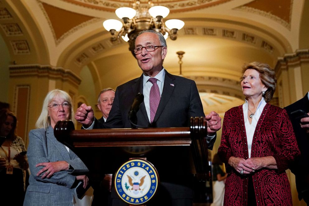 PHOTO: Senate Majority Leader Chuck Schumer is flanked by Senators' Patty Murray, Dick Durbin and Debbie Stabenow as he talks to reporters following the Senate Democrats weekly policy lunch at the Capitol, July 13, 2021. 