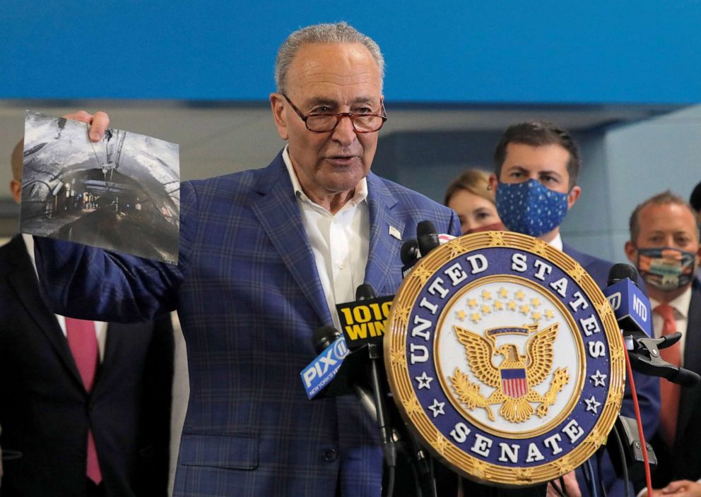 PHOTO: Senate Majority Leader Chuck Schumer and U.S. Transportation Secretary Pete Buttigieg address the media regarding a funding announcement for the Gateway Tunnel project in New York City, June 28, 2021.