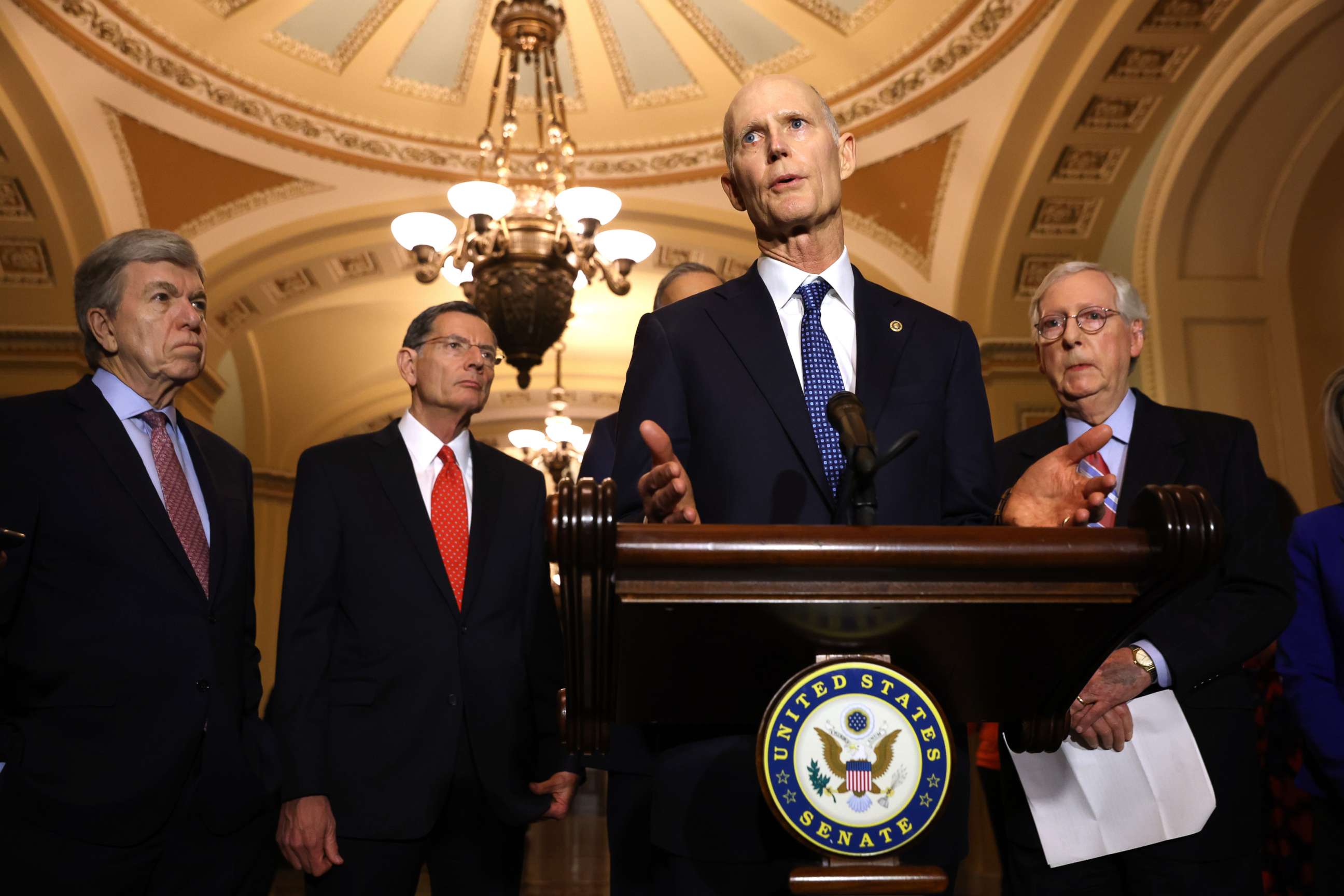 PHOTO: Sen. Rick Scott speaks to the media as Minority Leader Mitch McConnell looks on following the weekly Republican policy luncheon at the U.S. Capito, March 1, 2022 in Washington, DC.