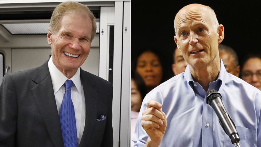 PHOTO: Sen. Bill Nelson, D-Fla., exits the Senate subway en route to a vote on Capitol Hill, June 20, 2018. Florida Gov. Rick Scott, center, speaks during a news conference, Aug. 22, 2018, in Fort Lauderdale, Fla.