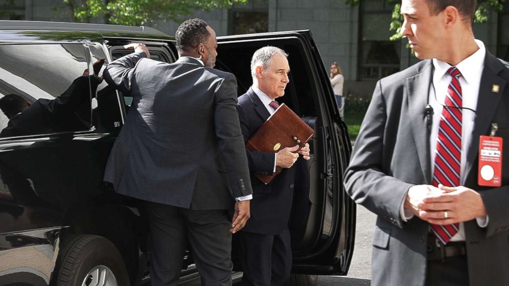 PHOTO: Surrounded by security agents, EPA Administrator Scott Pruitt steps out of his armored SUV as he arrives to testify before the House Energy and Commerce Committee's Environment Subcommittee on Capitol Hill April 26, 2018 in Washington.