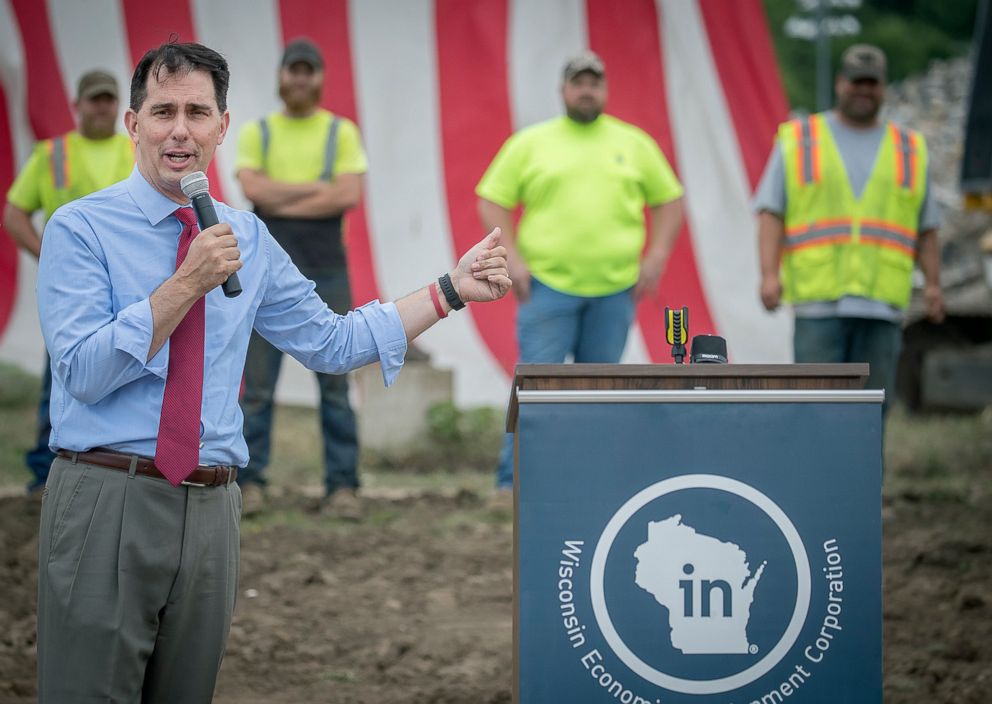 PHOTO: Wisconsin Governor Scott Walker announces a $500,000 state grant to support the demolition project of the long-dormant St. Croix Meadows dog racing track during a press conference at the site in Hudson, Wis, July 3, 2018.