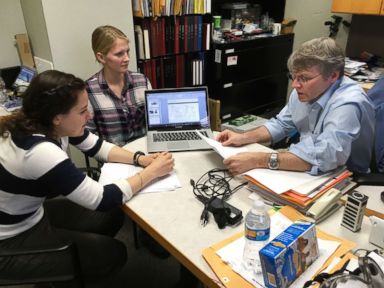 PHOTO: University of Wisconsin-Madison chemistry professor Robert Hamers confers with junior Alice Horein and doctoral candidate Sarah Guillot on their research projects during a meeting on campus on March 6, 2017.