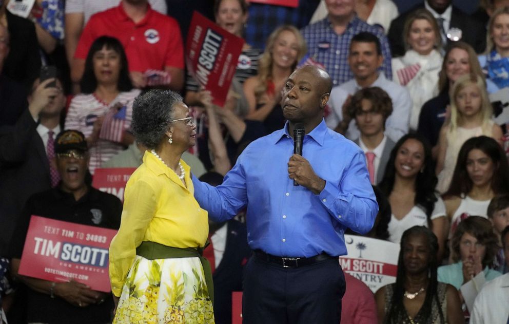 PHOTO: Sen. Tim Scott right, welcomes his mother Frances Scott on stage as he gives remarks at his presidential campaign announcement event at his alma mater, Charleston Southern University, May 22, 2023, in North Charleston, S.C.