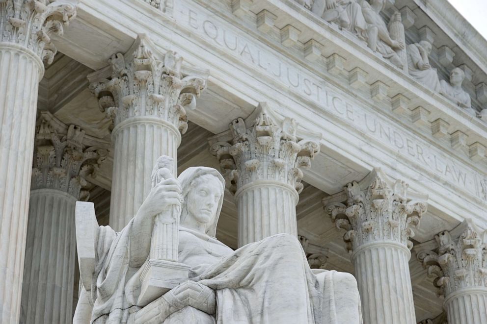 PHOTO: The statue Contemplation of Justice by sculptor James Earle Fraser stands on the steps of the U.S. Supreme Court which ruled that LGBTQ people can not be disciplined or fired based on their sexual orientation June 15, 2020 in Washington, DC.