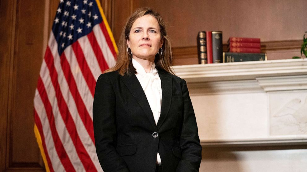 PHOTO: Judge Amy Coney Barrett, President Trump's nominee for Supreme Court, poses for a photo before a meeting in the Capitol, Oct. 1, 2020.