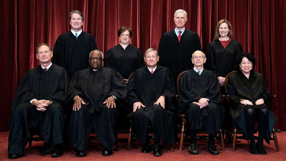 PHOTO: Members of the Supreme Court pose for a group photo at the Supreme Court in Washington, D.C., April 23, 2021.