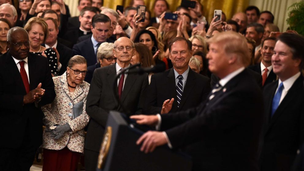 PHOTO: Supreme Court Associate Justices Clarence Thomas, Ruth Bader Ginsburg, Stephen Breyer and Samuel Alito listen as President Trump speaks during the swearing-in of Brett Kavanaugh as Associate Justice in Washington, Oct. 8, 2018. 