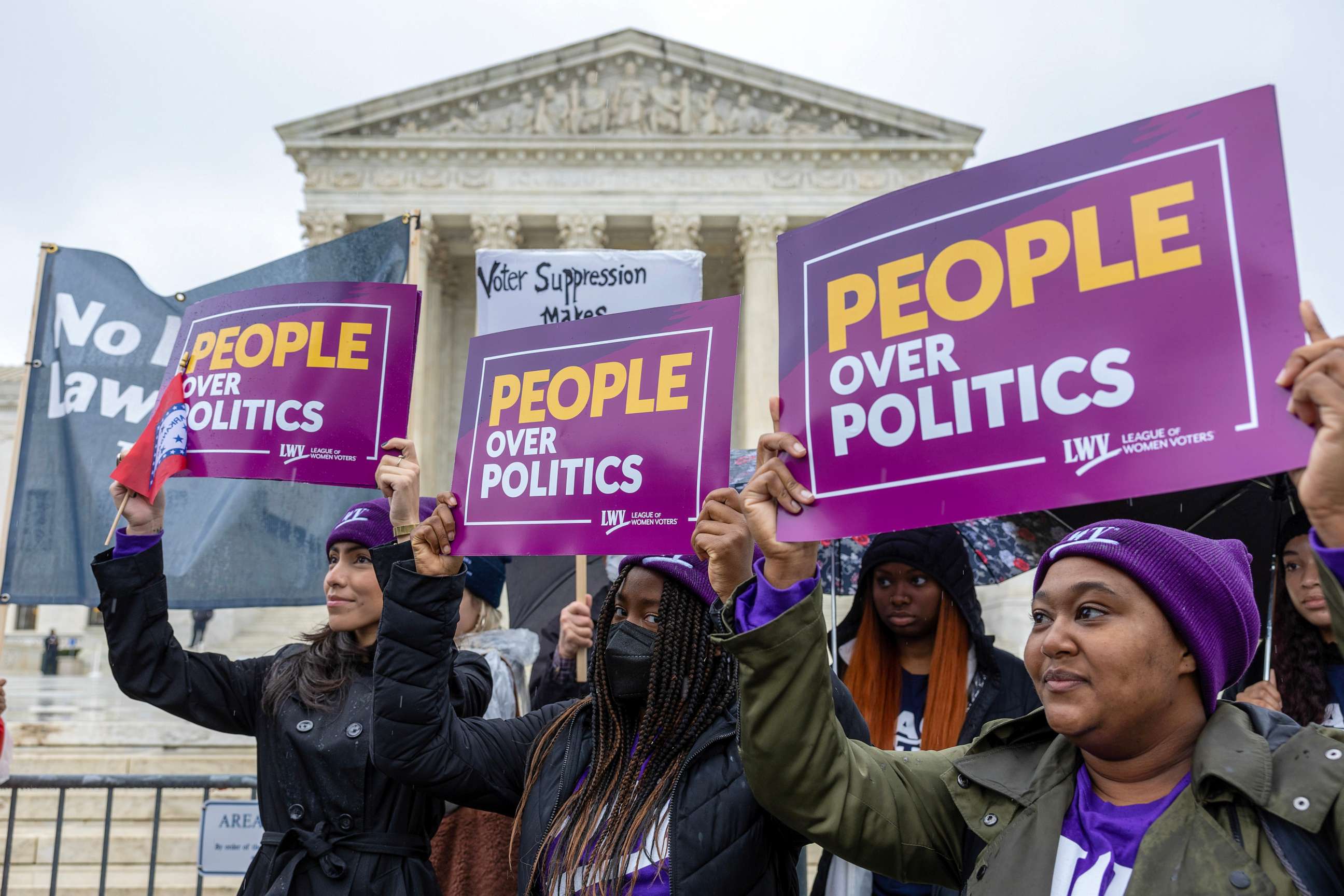 PHOTO: Demonstrators protest during a "No Lawless Lawmakers" rally at the Supreme Court during oral arguments in Moore v. Harper on Dec. 7, 2022 in Washington, DC.