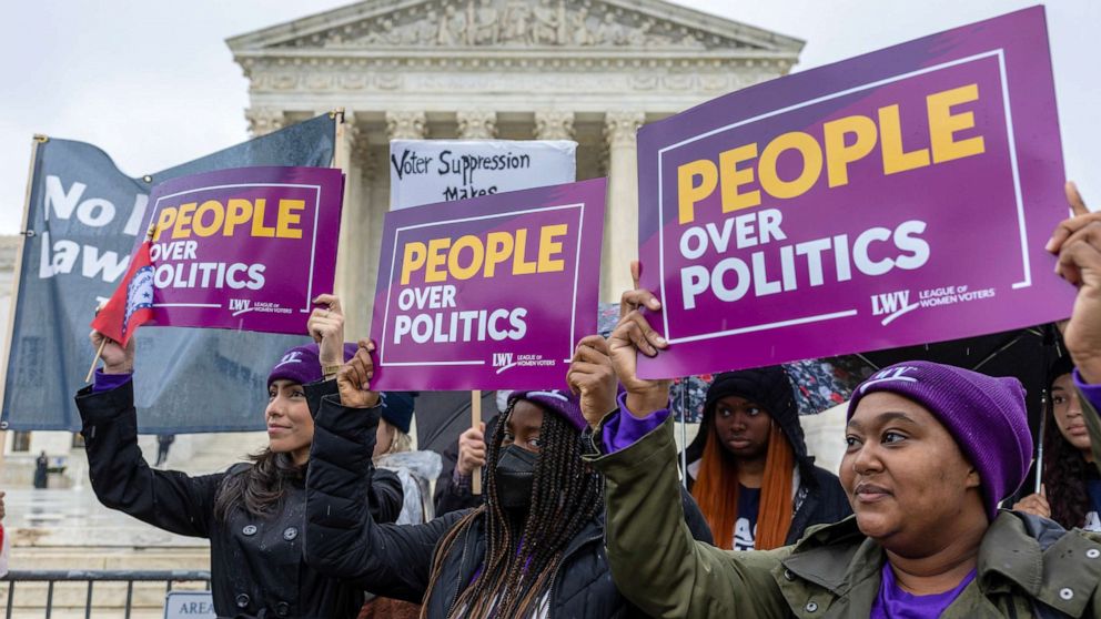 PHOTO: Demonstrators protest during a "No Lawless Lawmakers" rally at the Supreme Court during oral arguments in Moore v. Harper on Dec. 7, 2022 in Washington, DC.