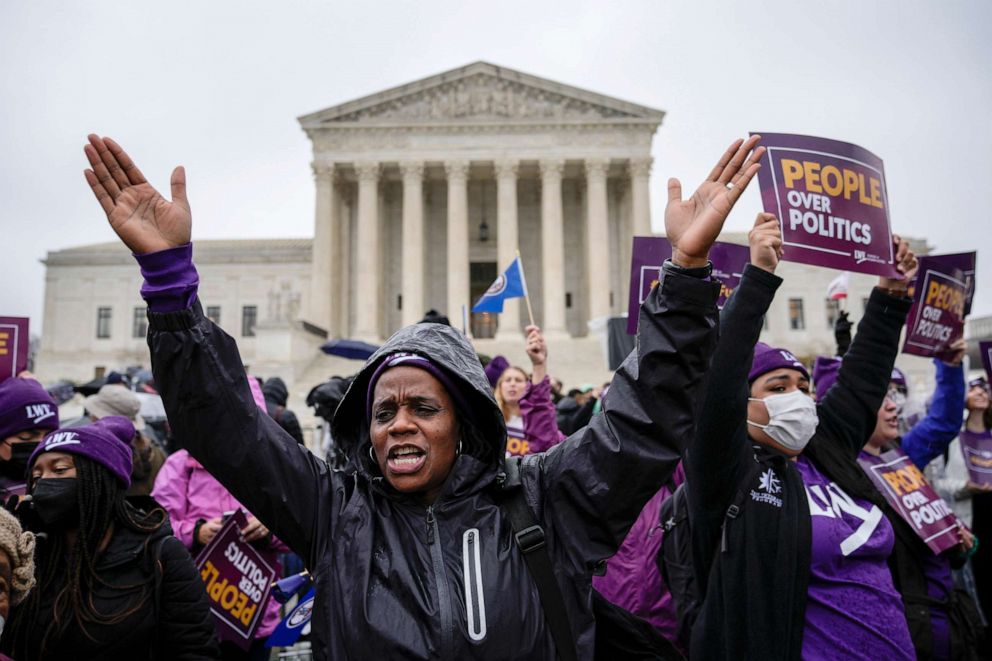 PHOTO: Members of the League of Women voters rally for voting rights outside the U.S. Supreme Court to hear oral arguments in the Moore v. Harper case on December 7, 2022 in Washington, DC.