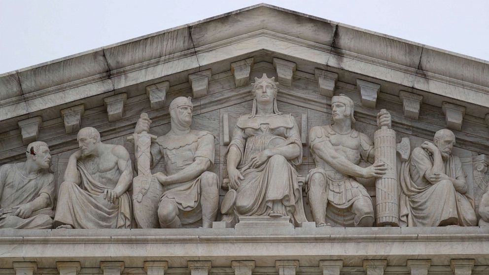 PHOTO: The West Pediment statue figures atop the U.S. Supreme Court building on Capitol Hill in Washington, D.C., Feb. 22, 2022.