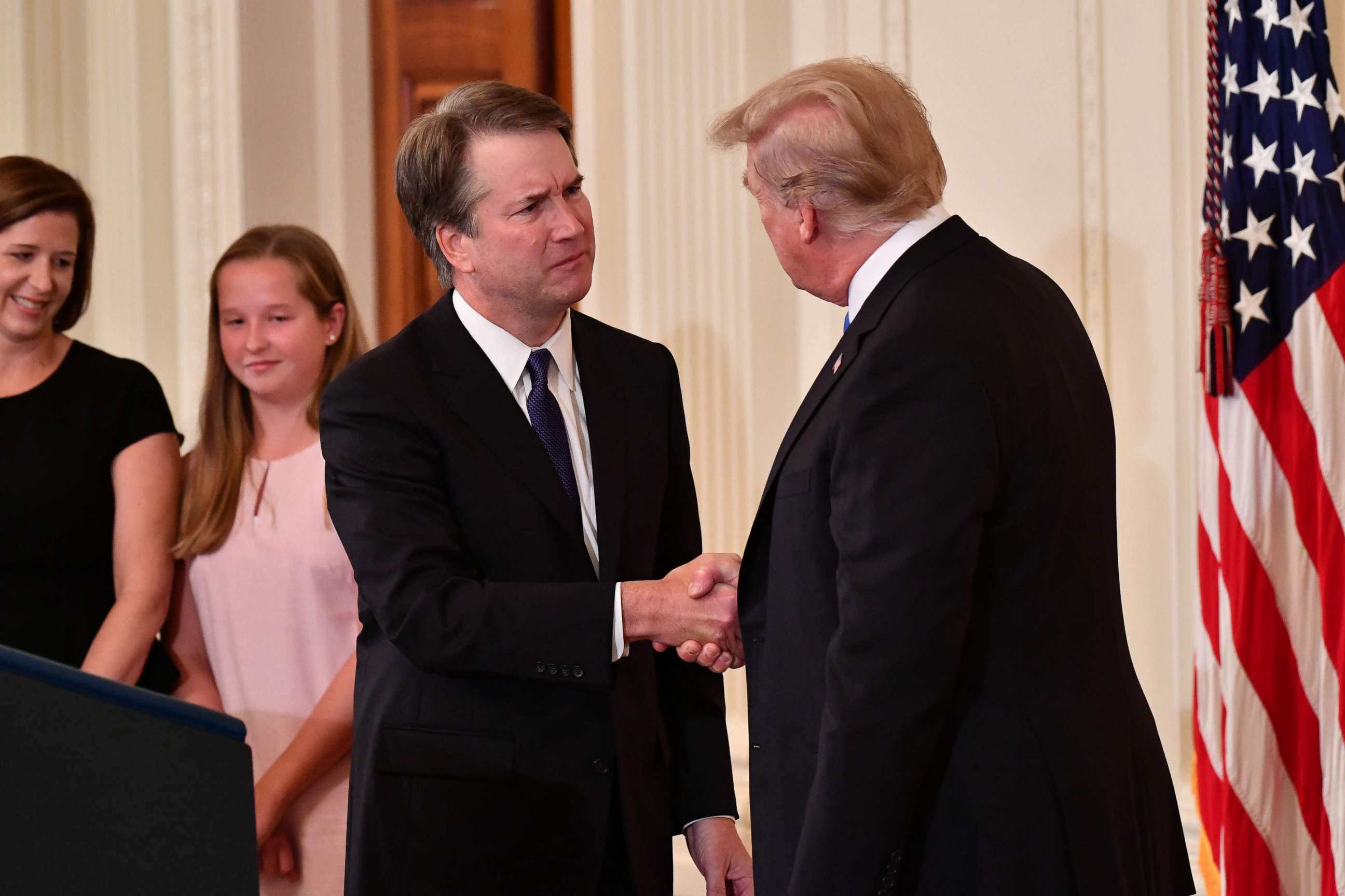 PHOTO: Supreme Court nominee Brett Kavanaugh shakes hands with President Donald Trump after he announced his nomination in the East Room of the White House on July 9, 2018 in Washington.