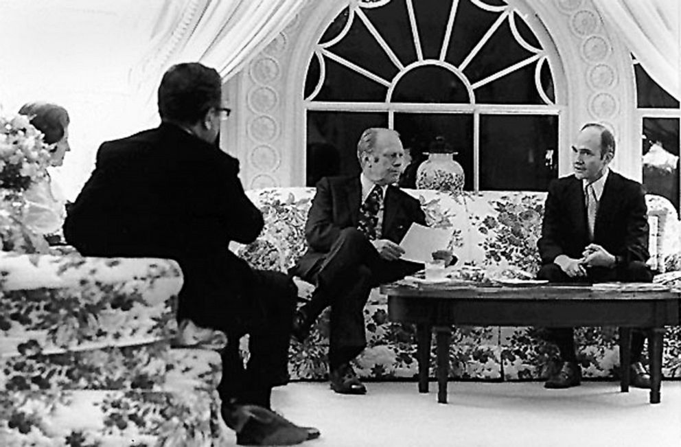 PHOTO: President Gerald Ford and Secretary of State Henry Kissinger, left, are briefed by National Security Adviser Brent Scowcroft, right, on the evacuation of Saigon, April 28, 1975 at the White House.