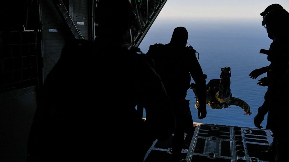 PHOTO: SEAL Team 7 members jump from an MC-130J Commando II during Emerald Warrior/Trident at Naval Air Station North Island, Calif., Jan. 19, 2019. Three SEAL Team 7 leaders were relieved of duty on Friday.