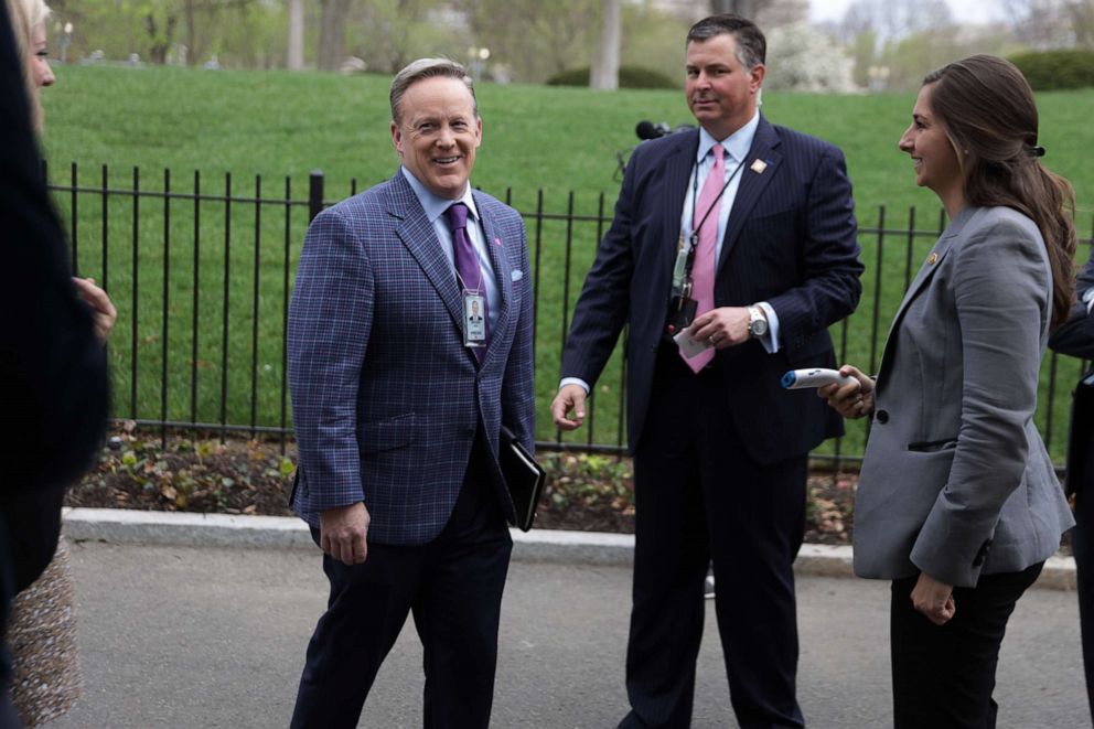 PHOTO: Former White House Press Secretary Sean Spicer arrives at the White House for a news briefing at the James Brady Press Briefing Room, March 20, 2020, in Washington.
