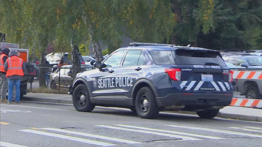 PHOTO: A police vehicle is parked at the scene of a school shooting in Seattle on Nov. 8, 2022.