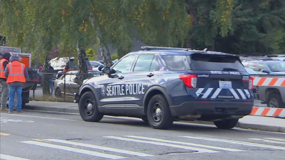  A constabulary  conveyance  is parked astatine  the country   of a schoolhouse  shooting successful  Seattle connected  Nov. 8, 2022.