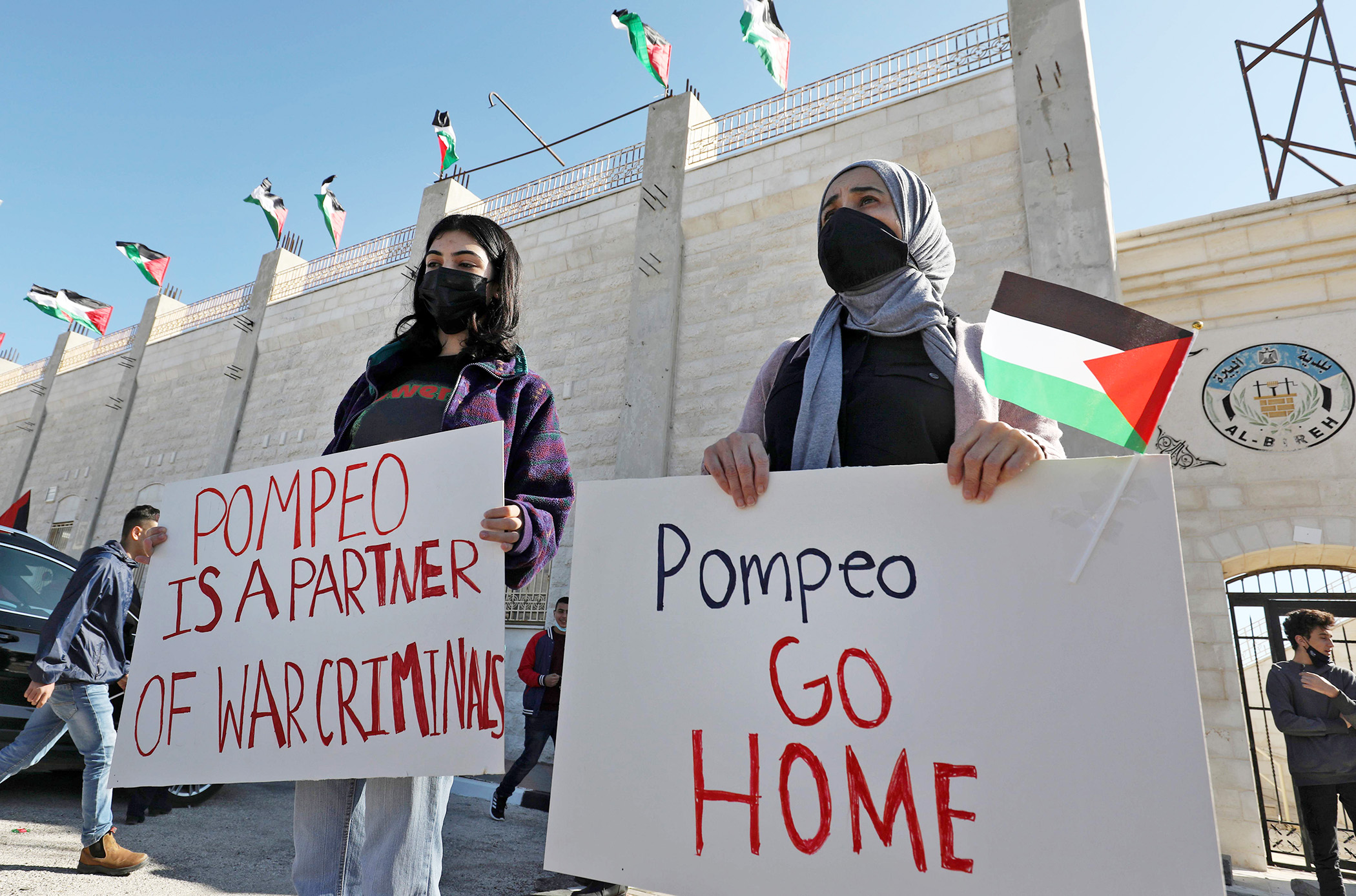 PHOTO: Palestinians demonstrate near the Israeli settlement of Psagot, built on the lands of the city of al-Bireh, against the visit by US Secretary of State's to the settlement in the occupied West Bank, Nov. 18, 2020.