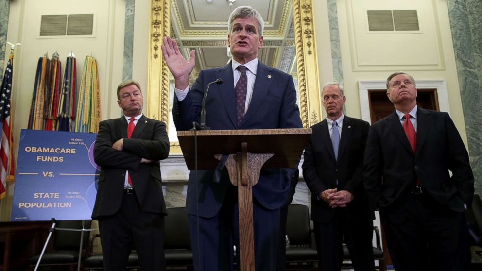 Sen. Bill Cassidy speaks as Sen. Dean Heller, Sen. Ron Johnson and Sen. Lindsey Graham listen during a news conference on healthcare, Sept. 13, 2017, in Washington.