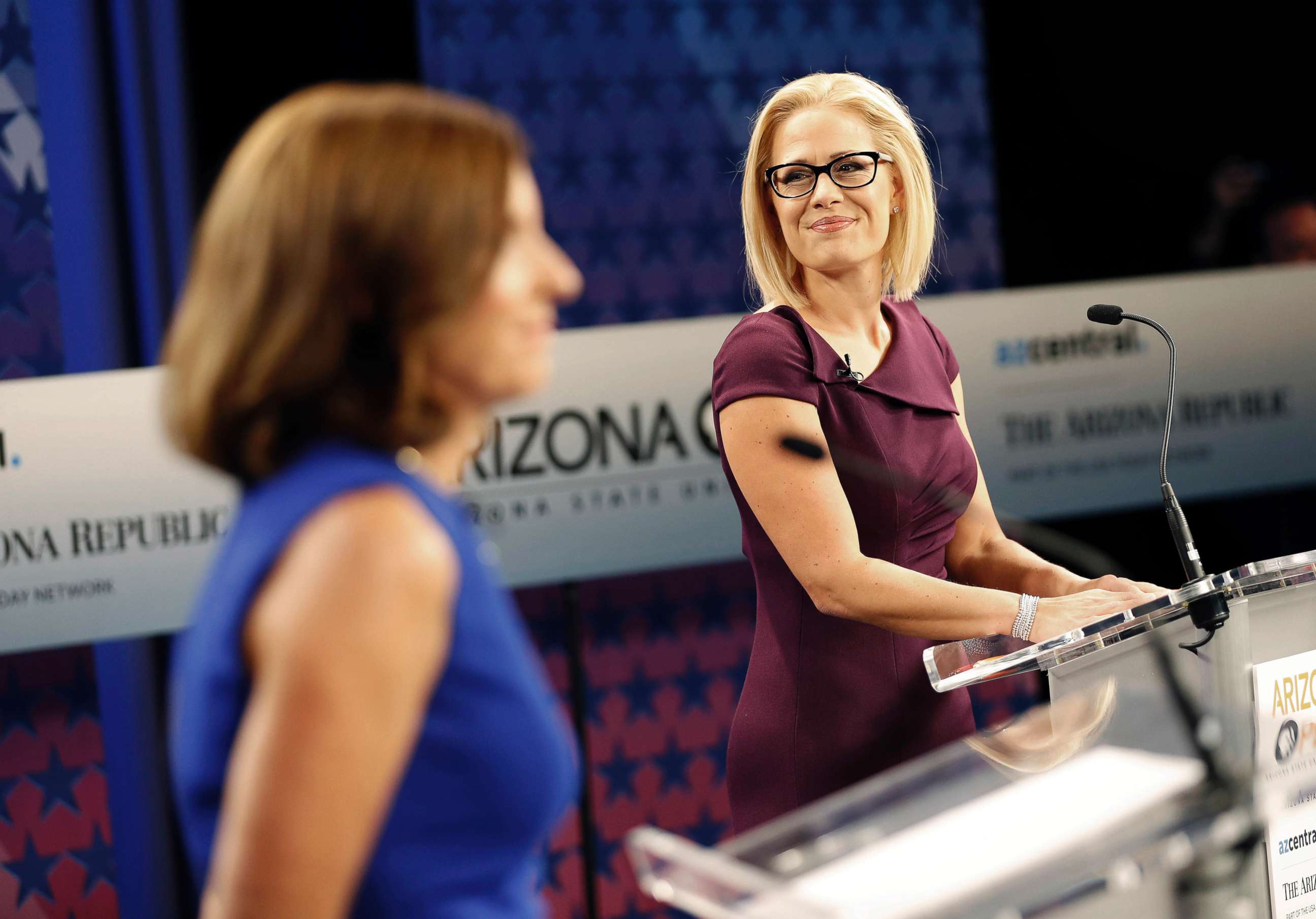 PHOTO: Senate candidates Rep. Martha McSally, left, and Rep. Kyrsten Sinema, prepare their remarks in a television studio prior to a televised debate, Oct. 15, 2018, in Phoenix.