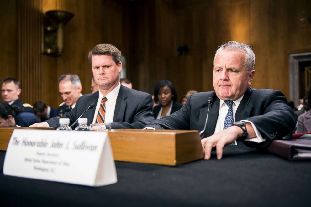 PHOTO: Deputy Secretary of State John Sullivan, right, prepares to testify during the Senate Foreign Relations Committee hearing on "The Administration's South Asia Strategy on Afghanistan," Feb. 6, 2018. 
