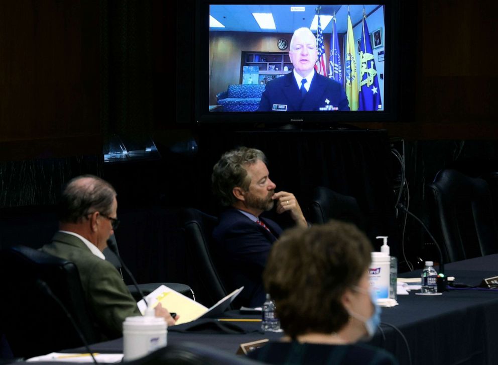 PHOTO: Senators listen to HHS Assistant Secretary for Health Admiral Brett Giroir speak remotely during a virtual Senate Committee for Health, Education, Labor, and Pensions hearing, May 12, 2020 on Capitol Hill in Washington.