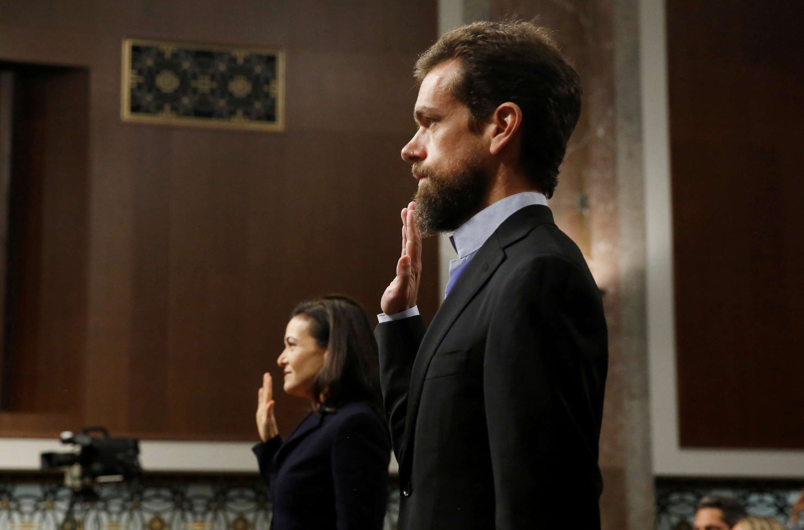 PHOTO: Twitter CEO Jack Dorsey and Facebook COO Sheryl Sandberg are sworn in to testify before a Senate Intelligence Committee hearing on foreign influence operations on social media platforms on Capitol Hill, Sept. 5, 2018.