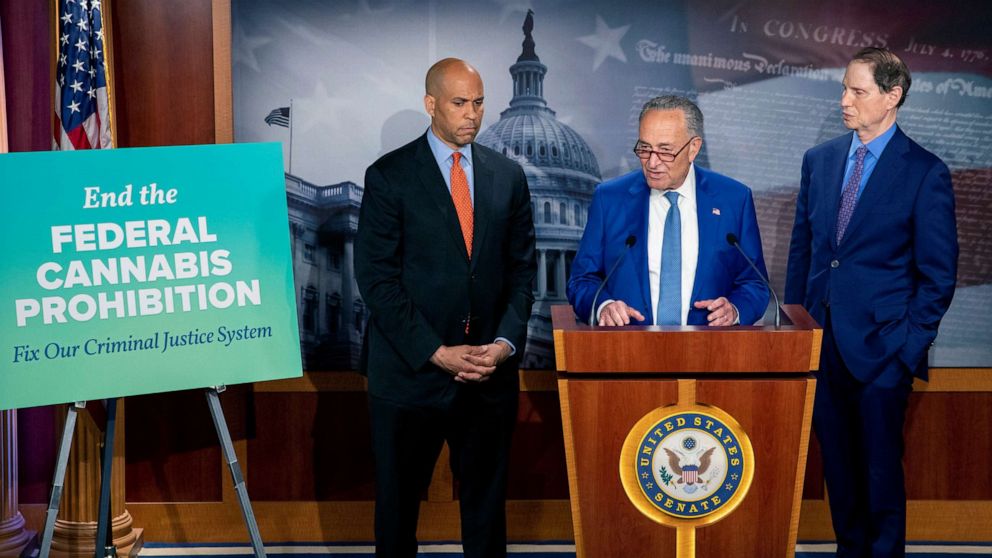 PHOTO: From left, Sen. Cory Booker, Senate Majority Leader Chuck Schumer, and Sen. Ron Wyden, announce a draft bill that would decriminalize marijuana on a federal level Capitol Hill in Washington on July 14, 2021.